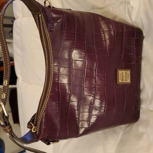 Dooney and Bourke aubergine crocodile embossed leather tote.